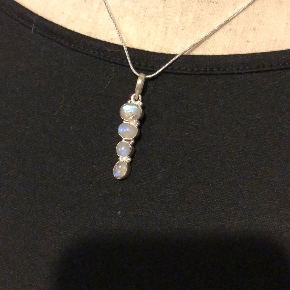 Rainbow moonstone pendant with chain.